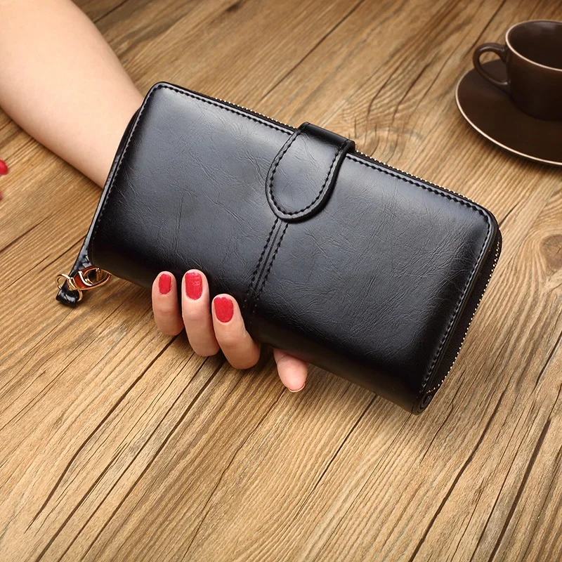Long PU leather women’s zipper clutch wallet with wristlet strap, card slots, and note compartment