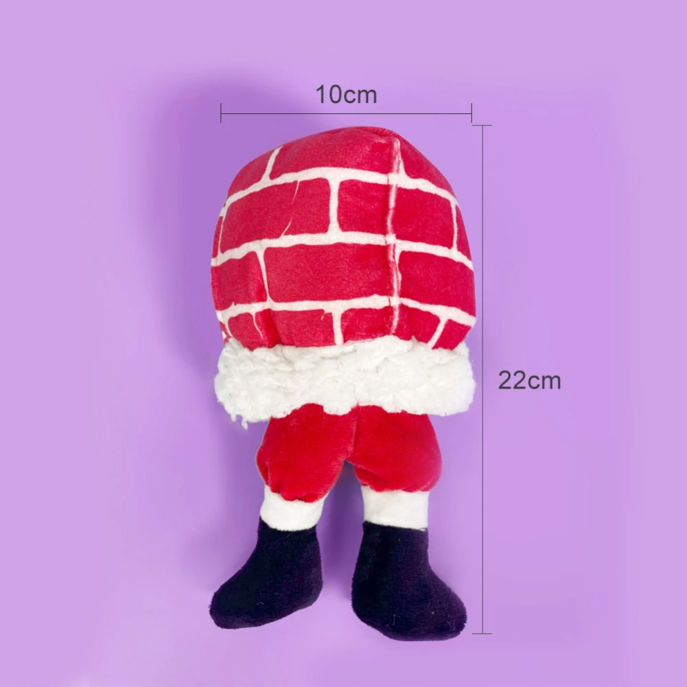 Un peluche que se asemeja a un personaje con gorro de Papá Noel. El juguete tiene un cuerpo rojo con un borde blanco y el sombrero también es rojo con un borde blanco, imitando la apariencia de una pared de ladrillos. El juguete está de pie y colocado sobre un fondo morado.