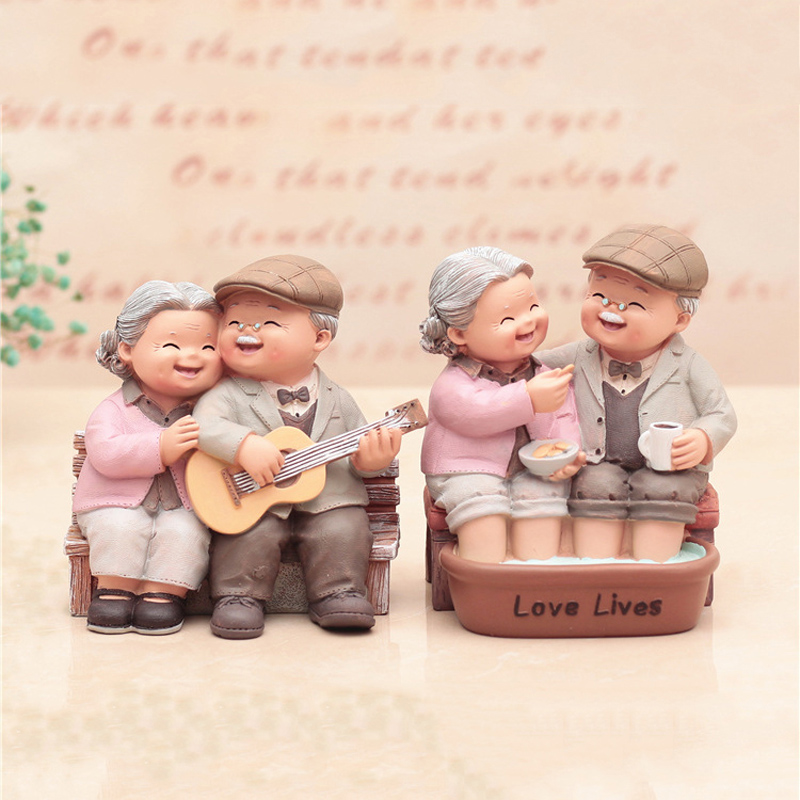 Amor dura estatueta o casal idoso aniversário