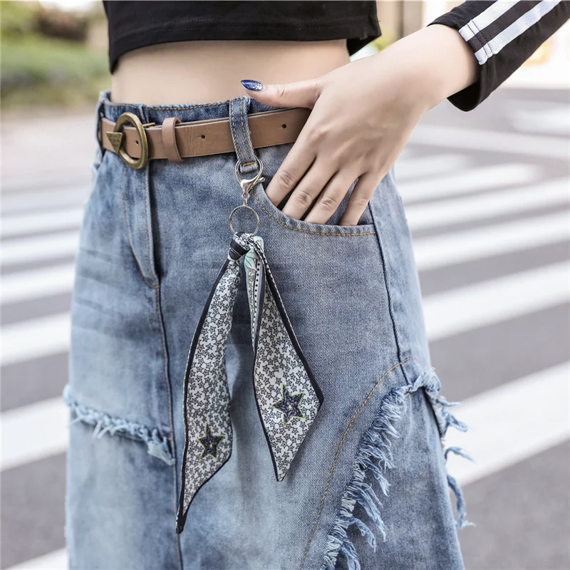 Women's denim skirt with high waist and large size, medium and long section with irregular raw edges