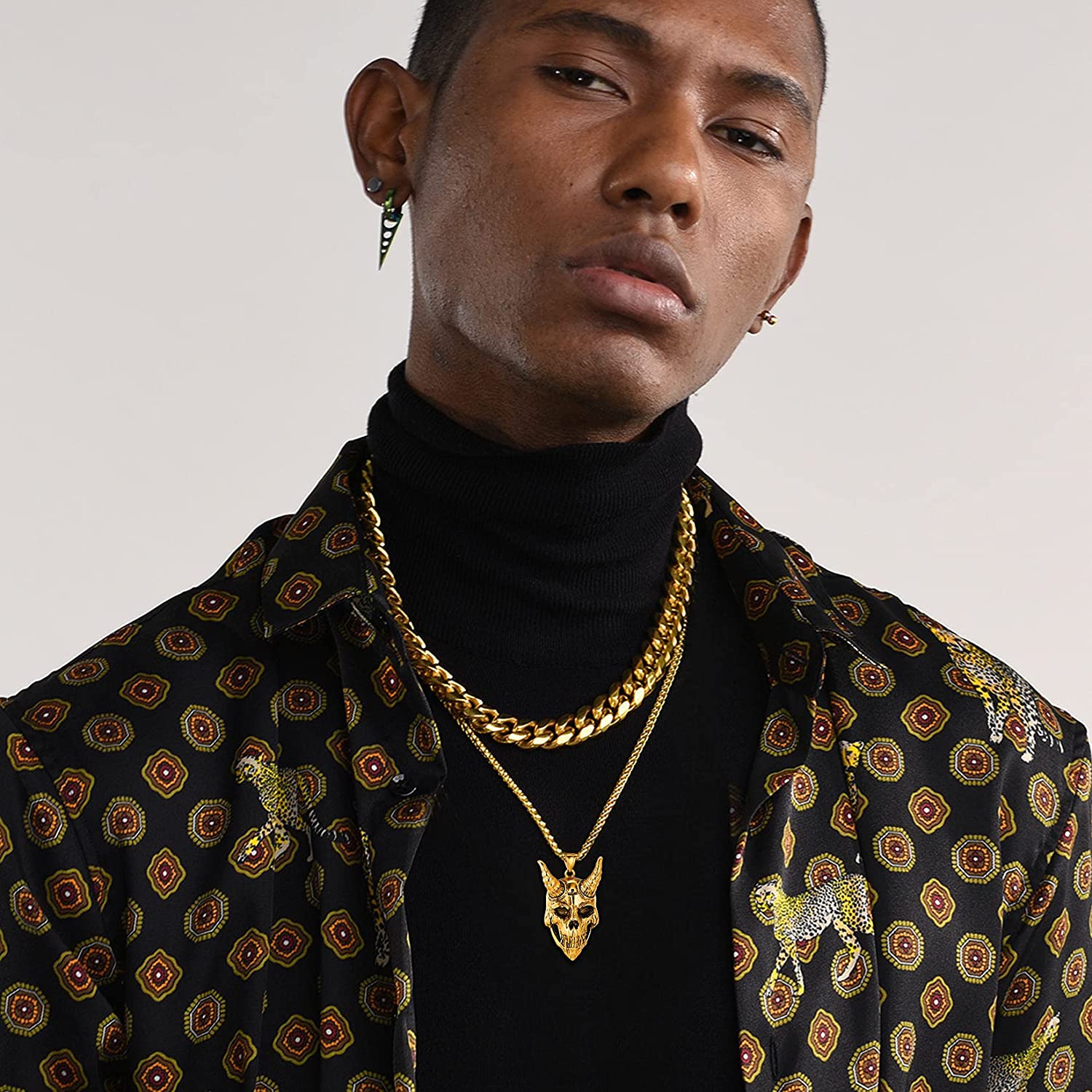 men wearing gold chain