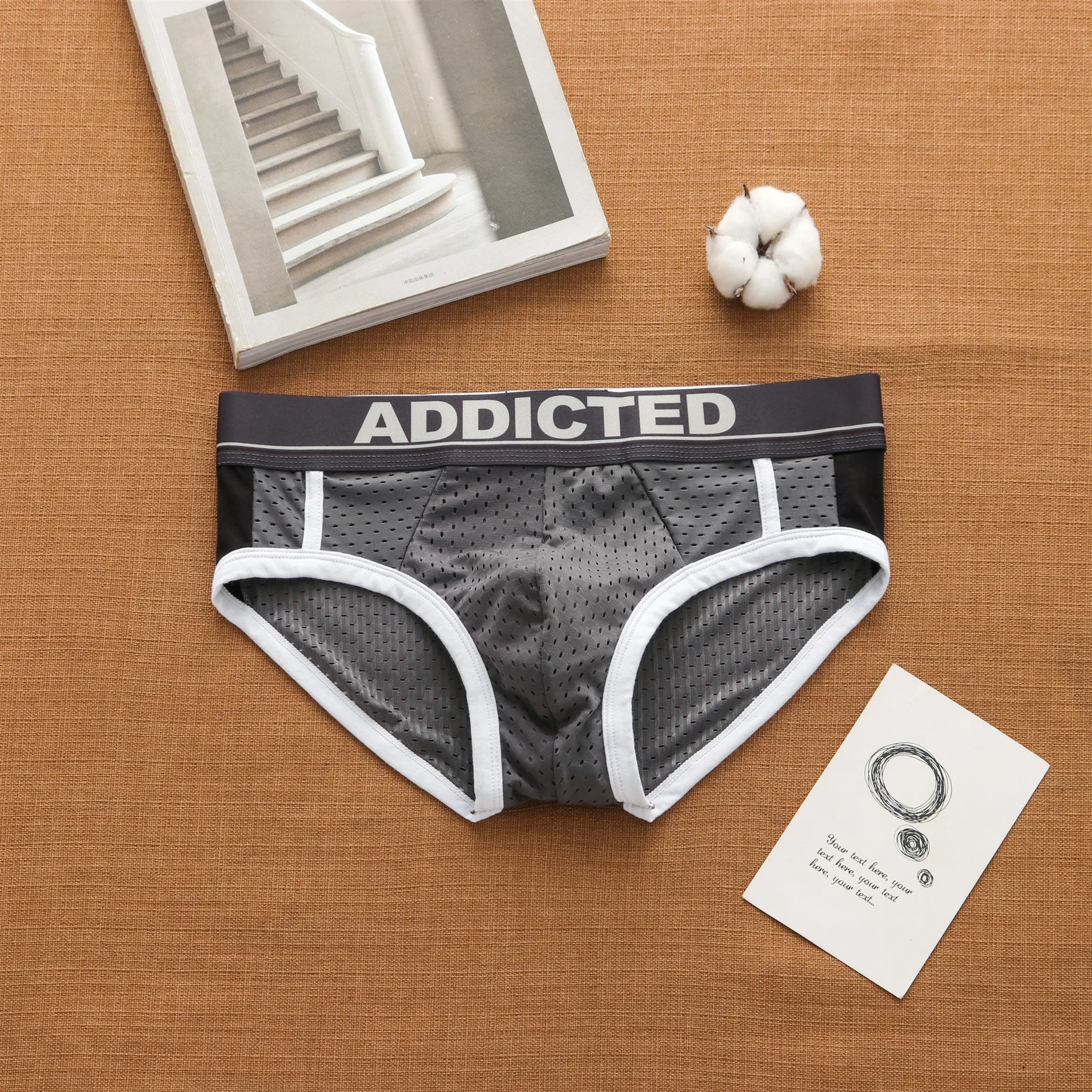 addicted Men's underwear sexy low waist breathable ice mesh hole comfortable fashion briefs for men jockey briefs