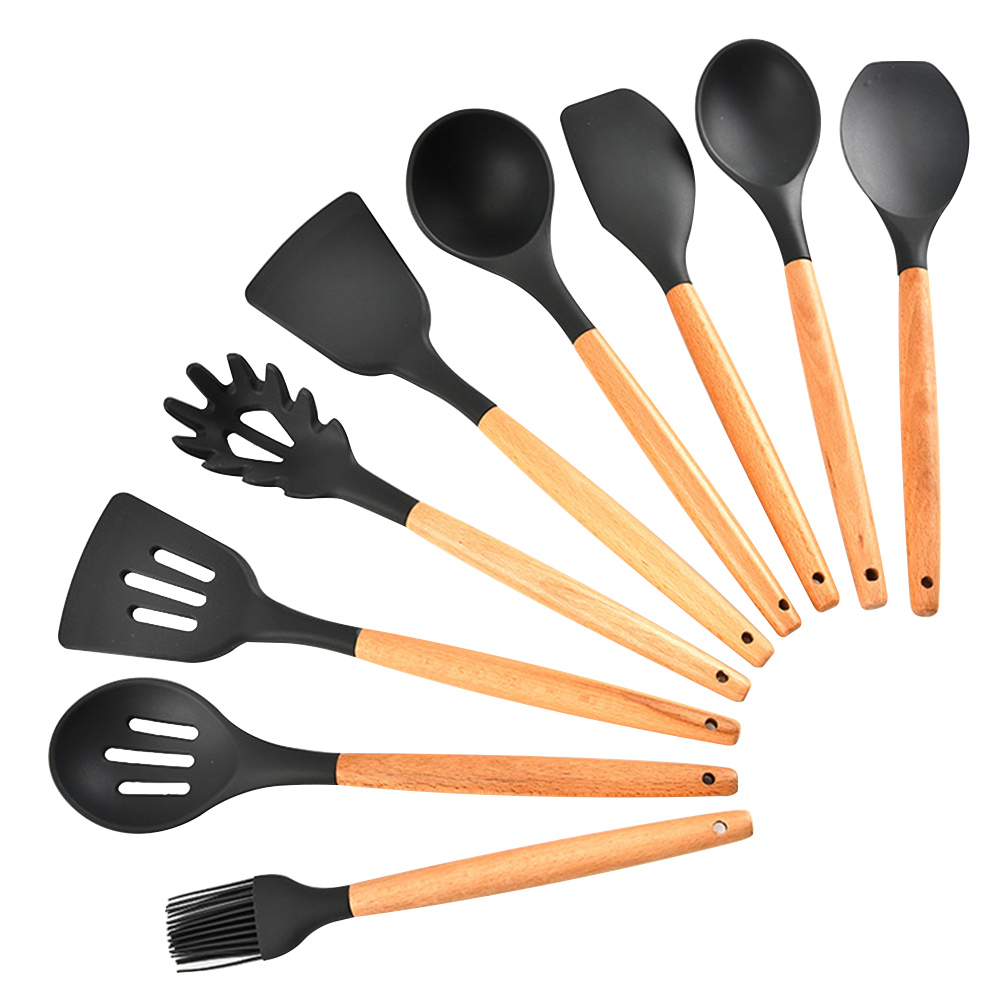 Ustensiles de cuisine anciens avec manche en bois