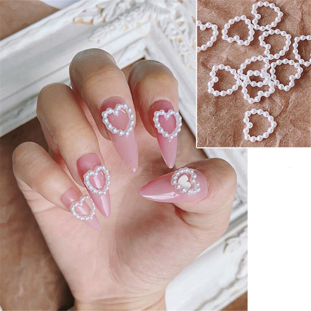 Best of 100pcs / Bag Korea Hollow Heart Pearl Nail Art Charms11mm Jewelry Sticker Pearls Decorations Graduated Color For Nails Design A604 Reviews & Tips