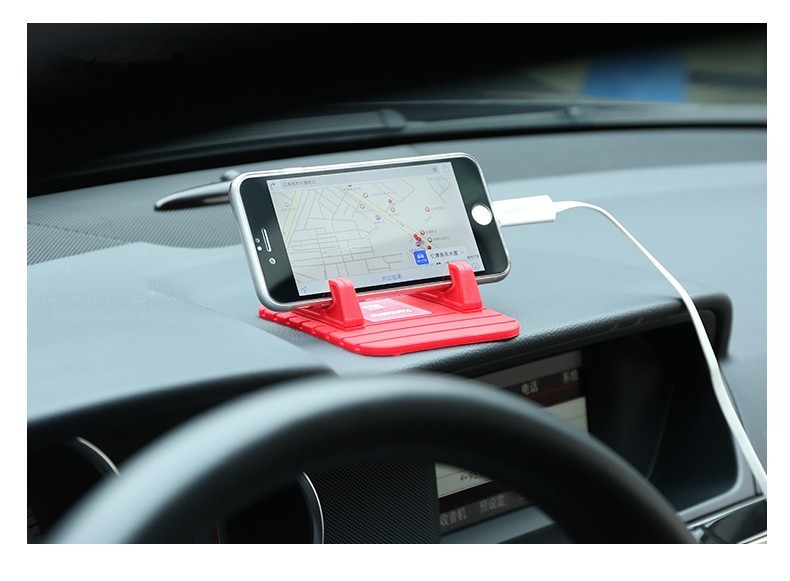 punane silikoonist telefonihoidja auto armatuurlaual, hoiab telefoni horisontaalselt