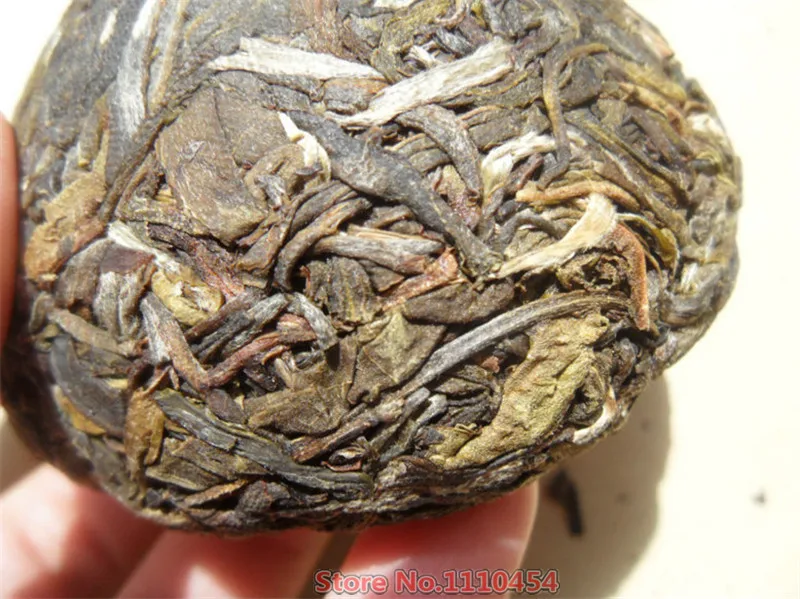 Yunnan Pu'er tea raw puer tea 100g puerh tuo cha pu erh old tree pu er tea green food China resistant brewing bright color sweet 