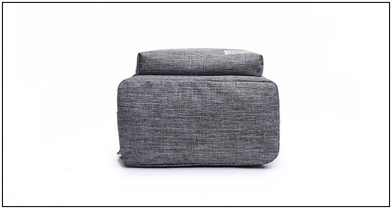 hall purjeriidest seljakott, millel on minimalistlik disain ja ristkülikukujuline kuju