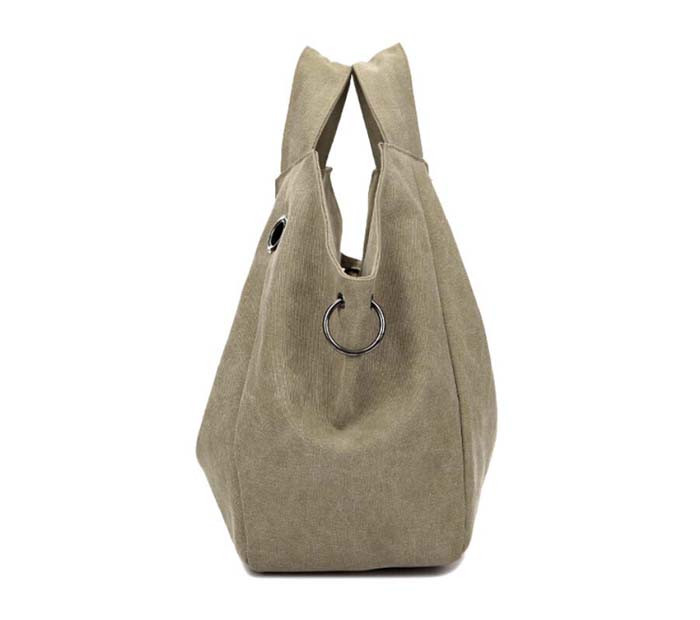 beež õlakott metallist rõngaga külje peal