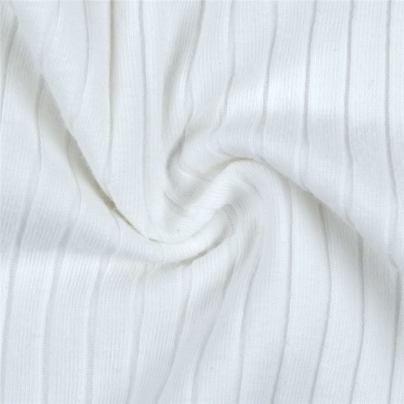 valge soonikkoes kangas keeratud kujul