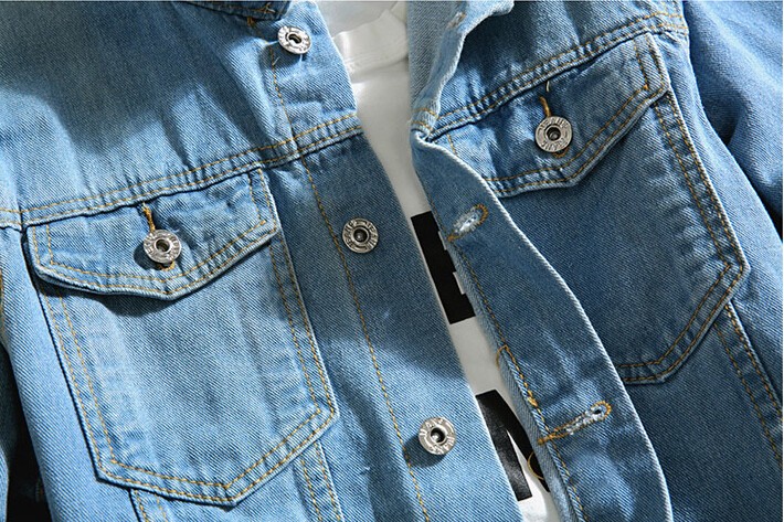 helesinine teksatagi hõlmik ja taskud