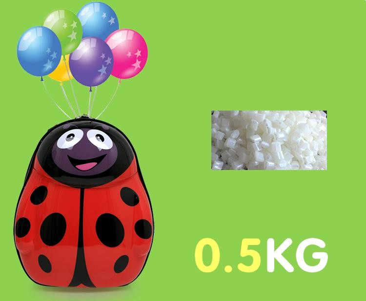 punane lepatriinu kujuline koolikott värviliste õhupallidega
