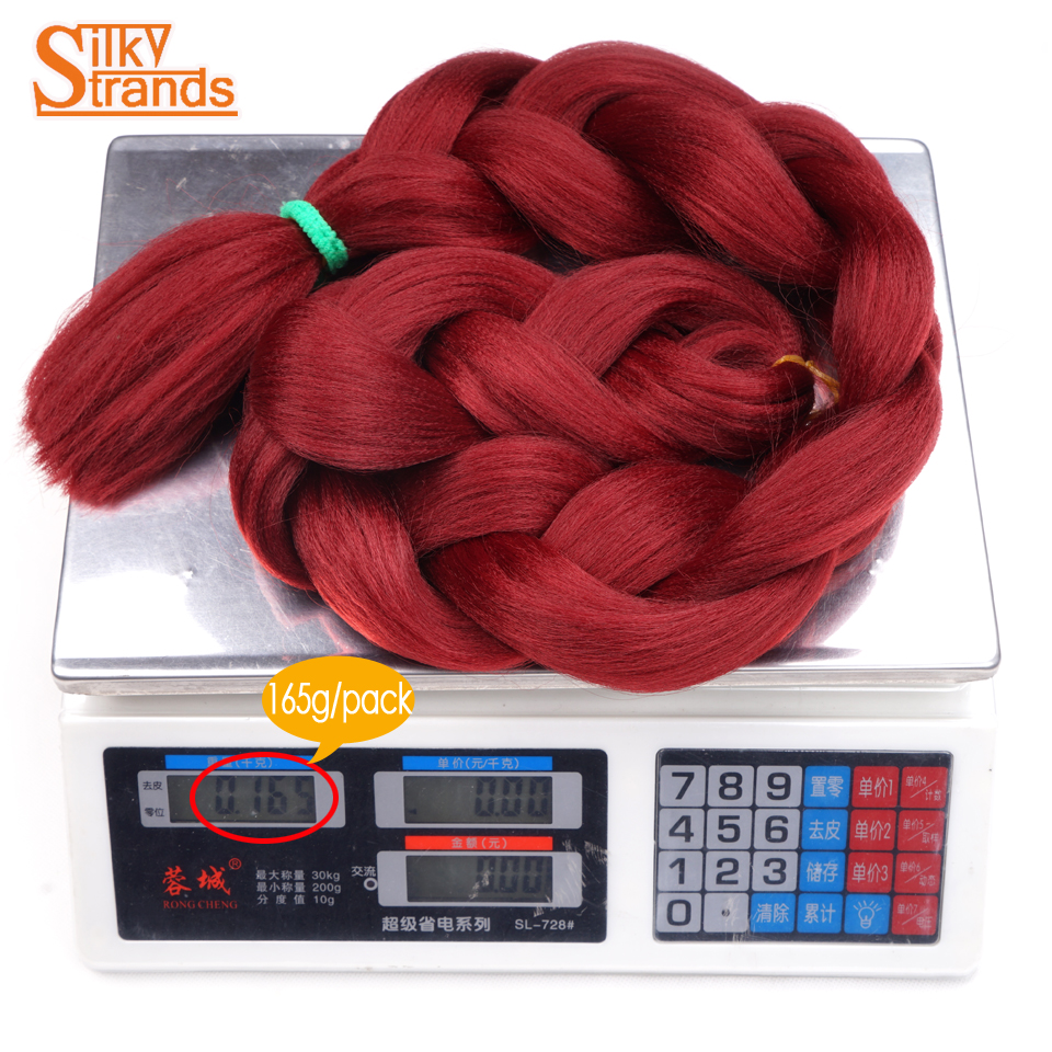 punased sünteetilised juuksepikendused kaalul