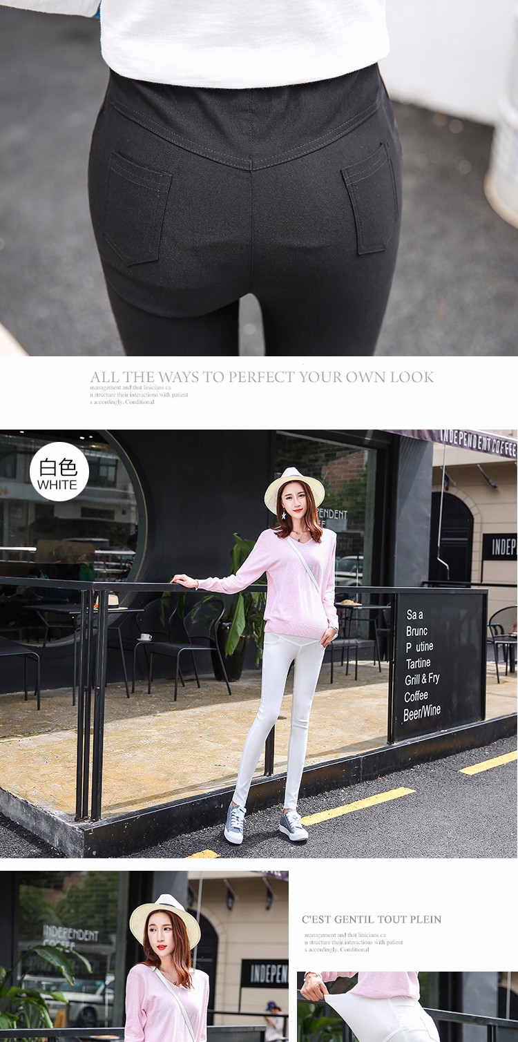 naine kannab musti ja valgeid rasedate pükse