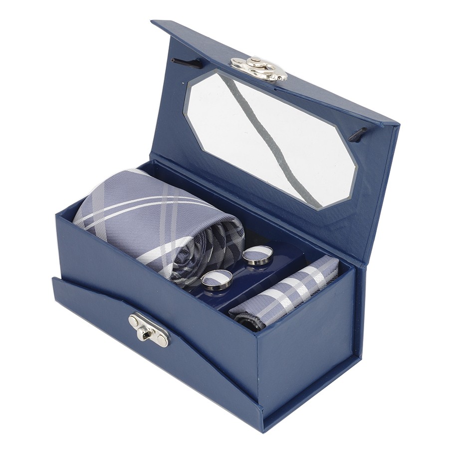 sinine kinkekarp, mis sisaldab siidist lipsu, mansetinööpe ja taskurätikut