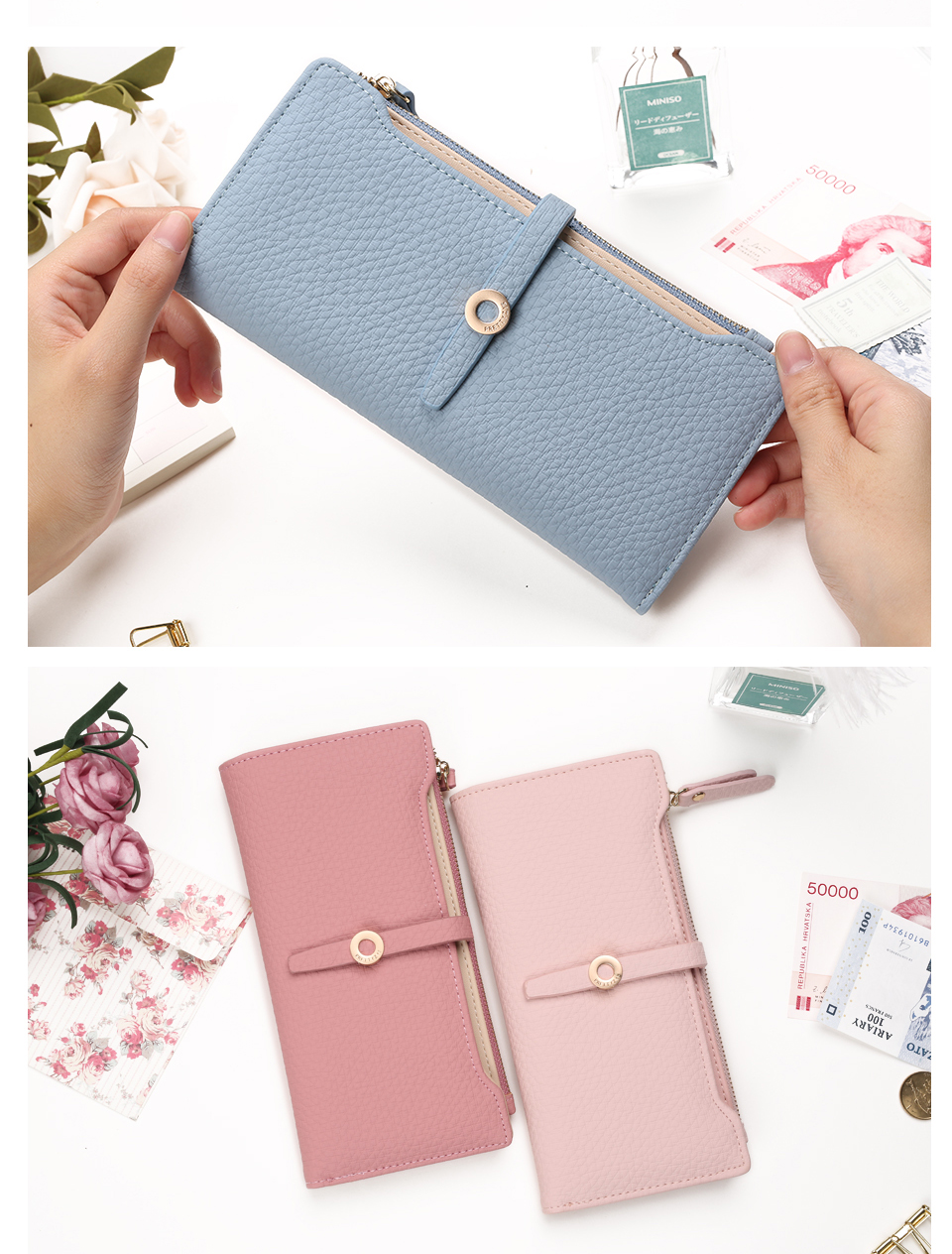 kolm erinevat värvi naiste rahakotti, sinine, roosa ja hele roosa, laual koos lillede ja rahatähtedega