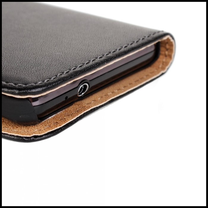 must nahast telefoniümbris, mis katab osaliselt telefoni