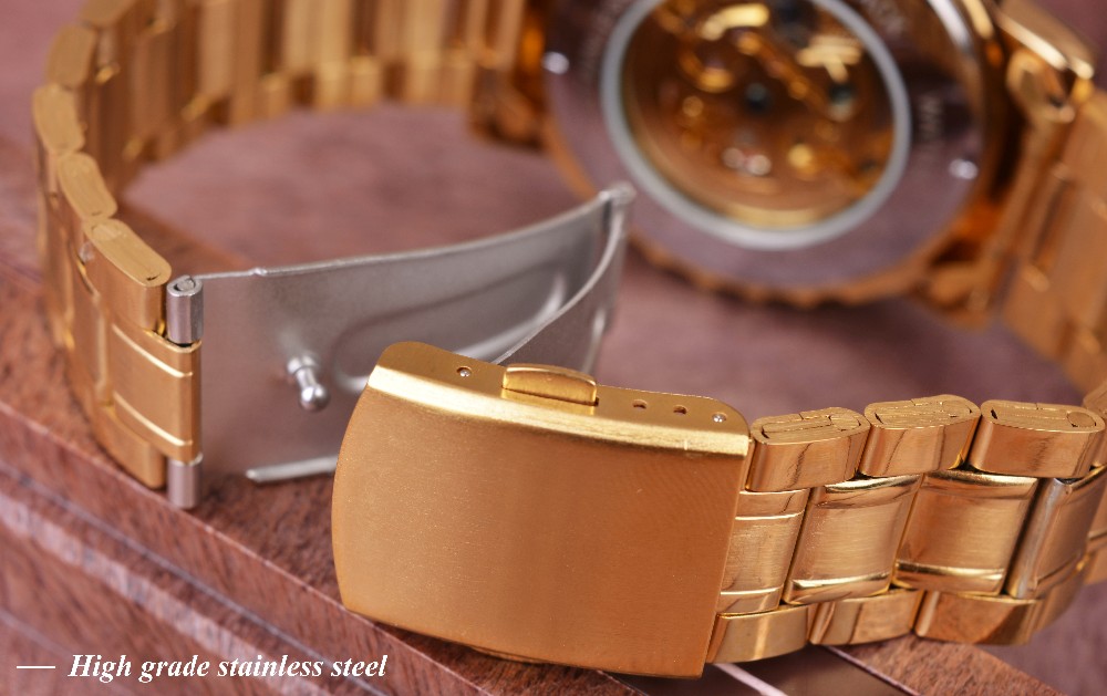 kuldse värvusega meeste käekell roostevabast terasest rihmaga