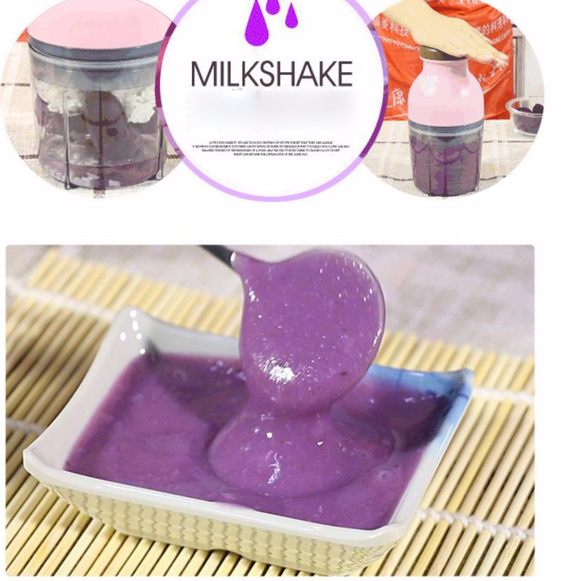 väike roosa blender koos lillaka smuutiga kausis