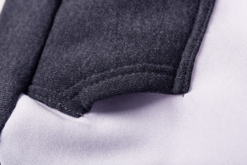 tumehall ja valge kangas lähivaates