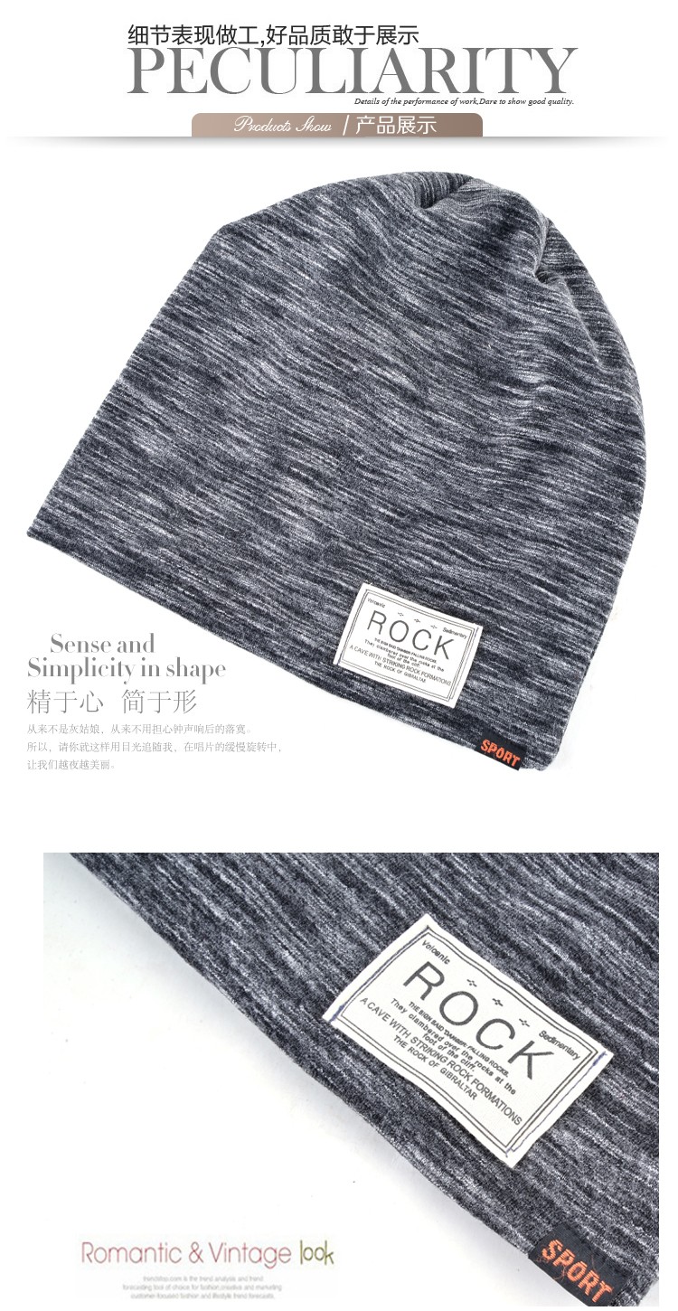 hall kootud meeste talvemüts, millel on valge silt ja oranž detail