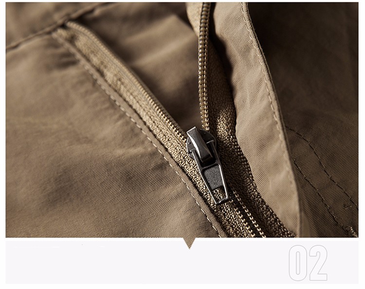 pruunide matkapükste lukuga tasku detail