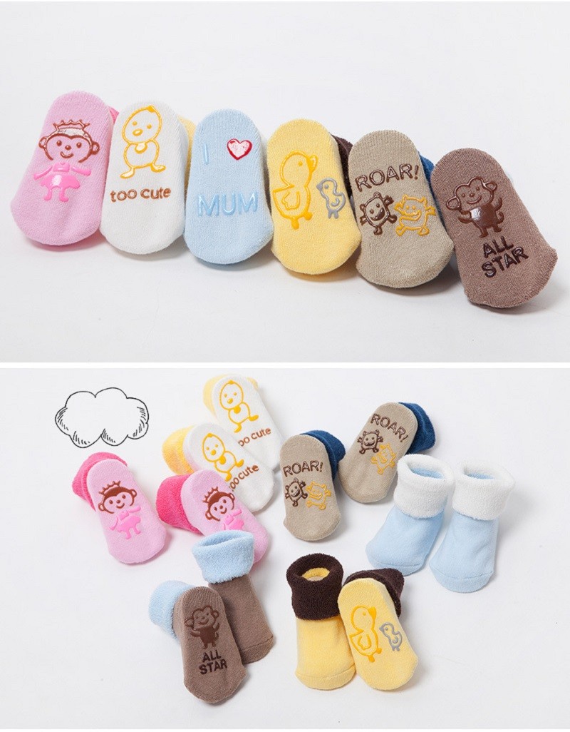 värvilised laste sokid erinevate loomapiltidega