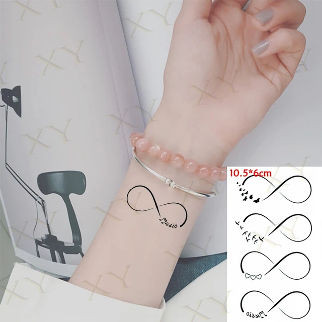 Music Armband Tattoo | Armband tattoo design, Arm band tattoo, Hand and  finger tattoos