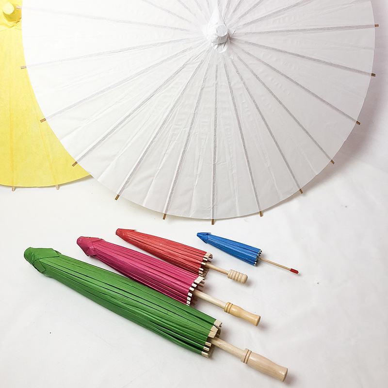 Description Picture 6 of item20cm/30cm/40cm/60cm/82cm Diameter Bamboo Wedding Umbrella Parasol White Paper Long Handle Wedding Favor Parasol Cloth Umbrella