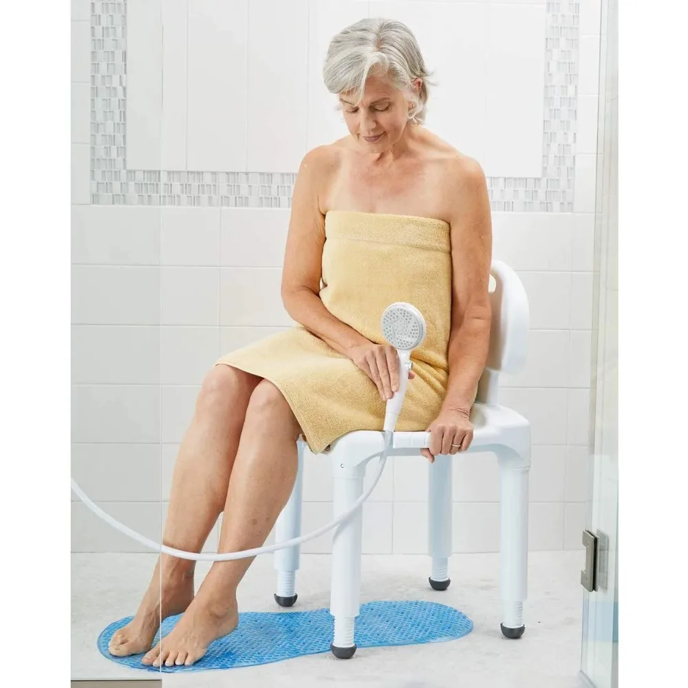 A woman is sitting on a slip-resistant Bath chair in the shower, ensuring extra safety.