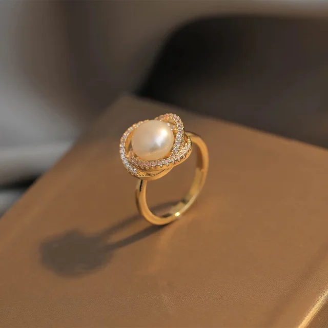 El francés elegante Anillo de perla barroca de los anillos de complementos  para mujer - China Estilo europeo y aretes de perlas precio