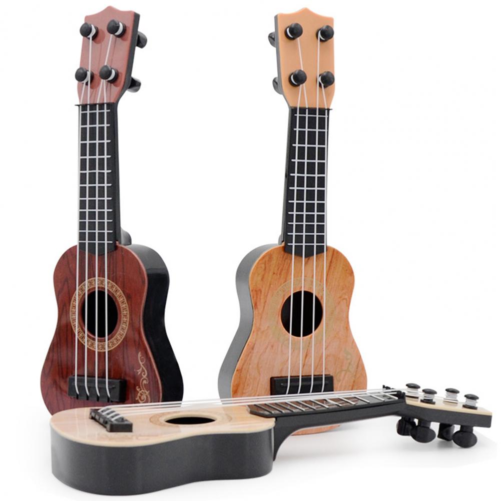 Description Picture 2 of itemMini Guitar 4 String Classical Ukulele Guitar Toy Instrument Children Beginners Simulation Playing Early Teaching Small Guitar