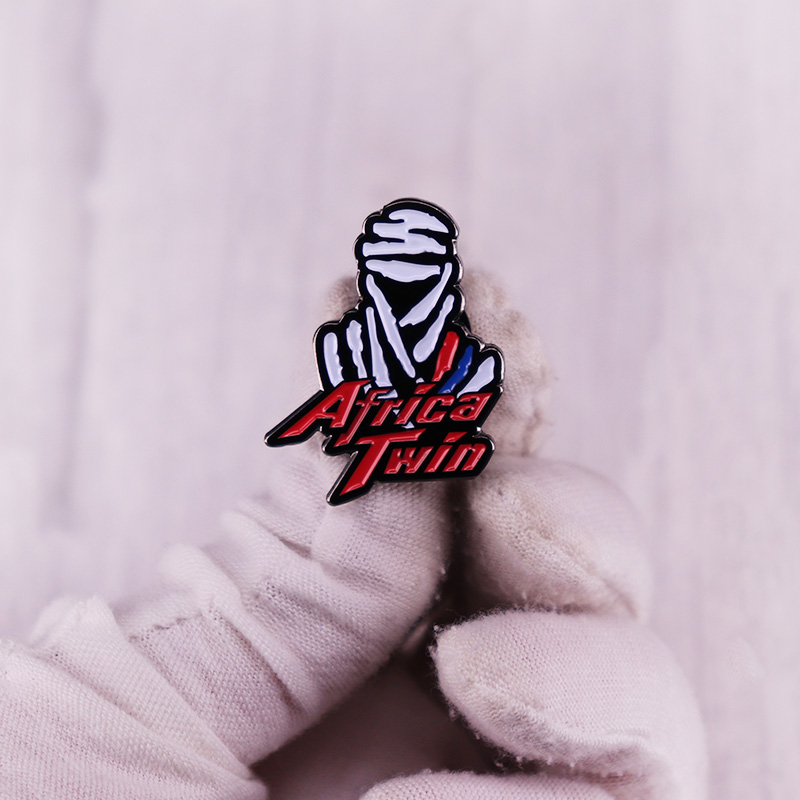 Africa Twin rally enamel pin brooch detail view showing enamel fill and rubber clutch back