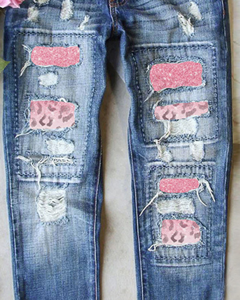 Title 4, Jeans strappati con stampa ghepardo a contrasto...