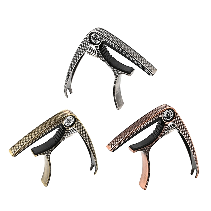 Description Picture 2 of item448D Guitar Capo Zinc Alloy Guitar Tunings Tone Clip for 6 Strings Acoustic Electric Ukulele Banjo Mandolin Bass Instruments