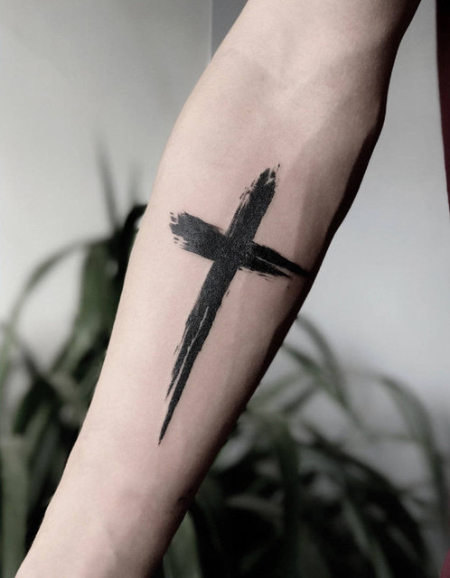 cross hip tattoos