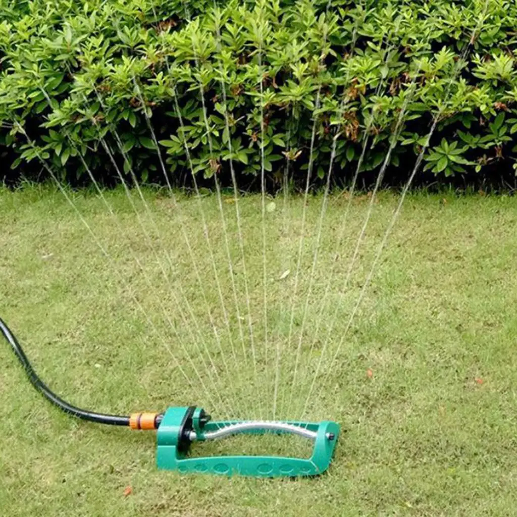 Oscillating Garden Lawn Watering Sprinkler with Hose Connector Grass Plants