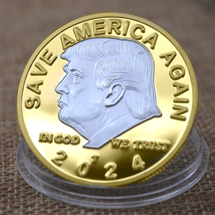 2024 commemorative 'donald trump coin' showcasing a detailed silver embossment of President Trump's face against a golden surface.