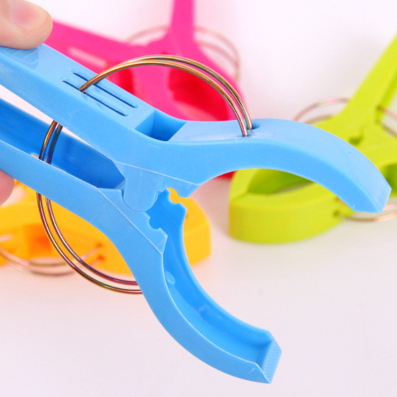 Description Picture 5 of item4/8pcs Large Bright Colour Clothes Clip Plastic Beach Towel Pegs Clothespin Clips To Sunbed Home Wardrobe Storage High Quality