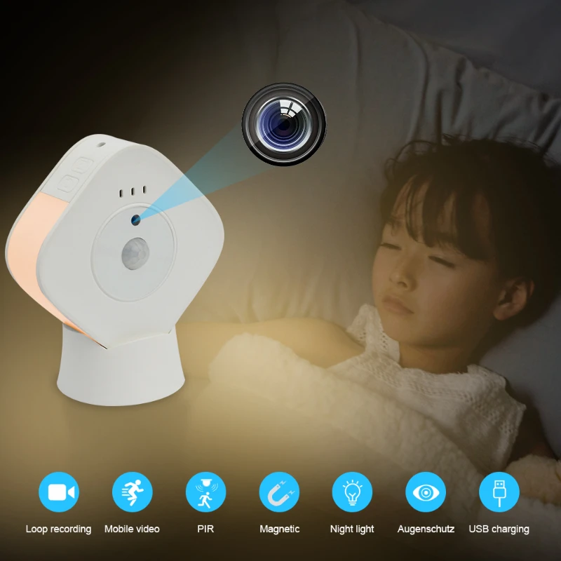 An image of a child sleeping in bed with a SpyCam Night Light.