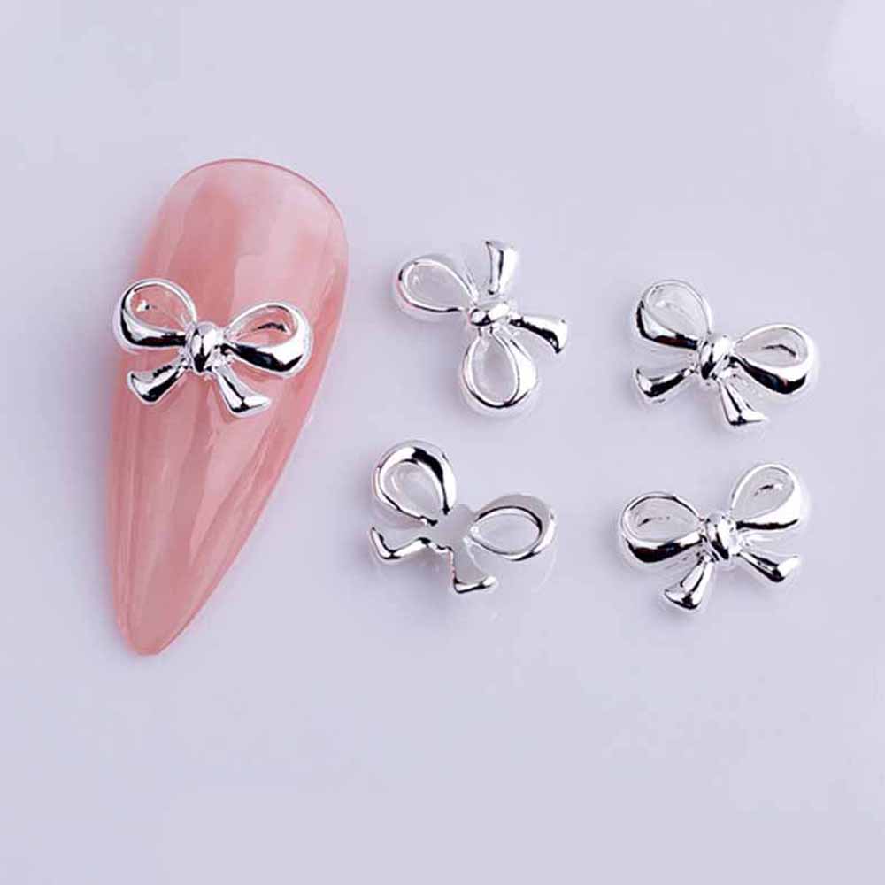 Best of 20pcs Alloy Ribbon Bows Nail Art Charm 3D Gold / Silver Mini Hollow Bowknot Nail Decor Parts DIY Japanese Design Nail Parts Reviews & Tips