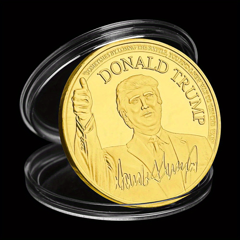 Exclusive donald trump coins with iconic thumbs-up salute in gold plating.