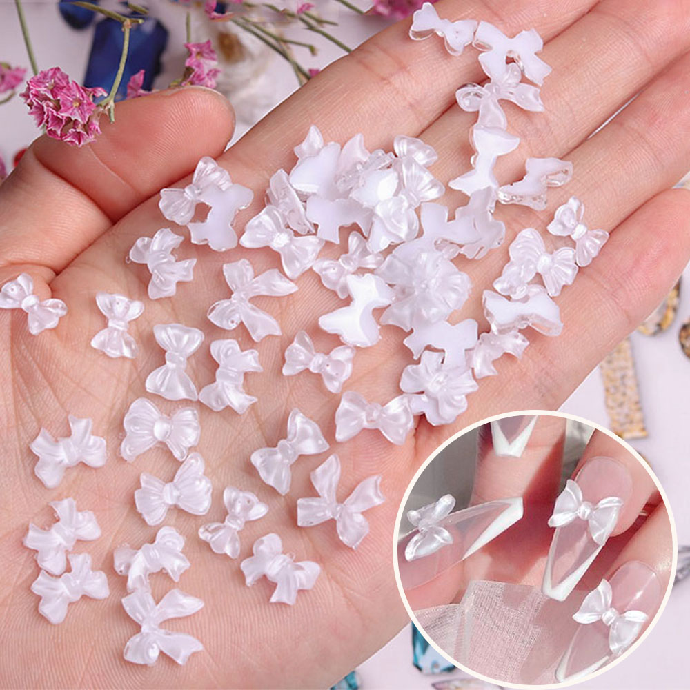 Best of 100Pcs Ice Transparent Bow 10*11mm Resin Bowknot Nail Art Decor DIY 3D Cute Kawaii Ice Ribbon Manicure Accessories ZCF-1M5HY Reviews & Tips