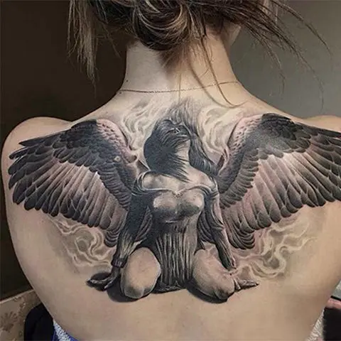 Тату ангелов на спине — фото и эскизов татуировок года