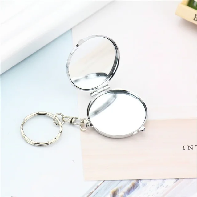 Double Sides Cosmetic Mirror Keychain 1PC Mini Folding Mirror Key Chains  Pocket Portable Square Oval…See more Double Sides Cosmetic Mirror Keychain