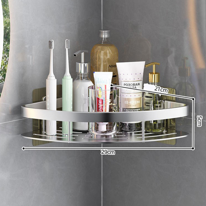 Bathroom storage corner shelf with metal grid holding skincare items