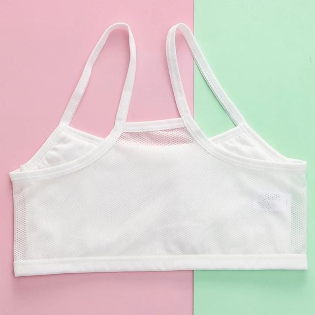 White sports bra with mesh and padding with a sexy design