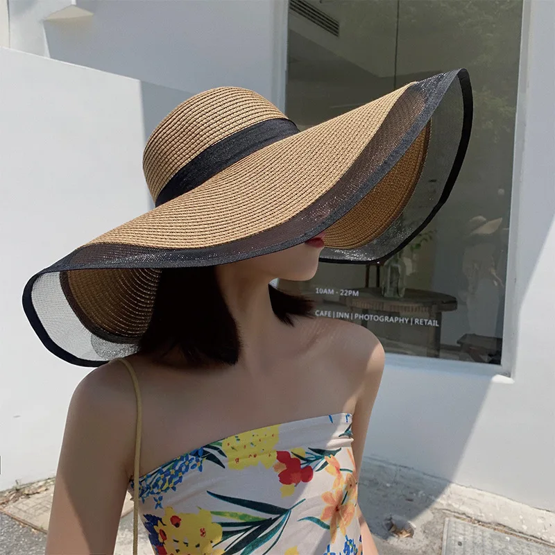 Женская шляпа с широкими полями и лентой