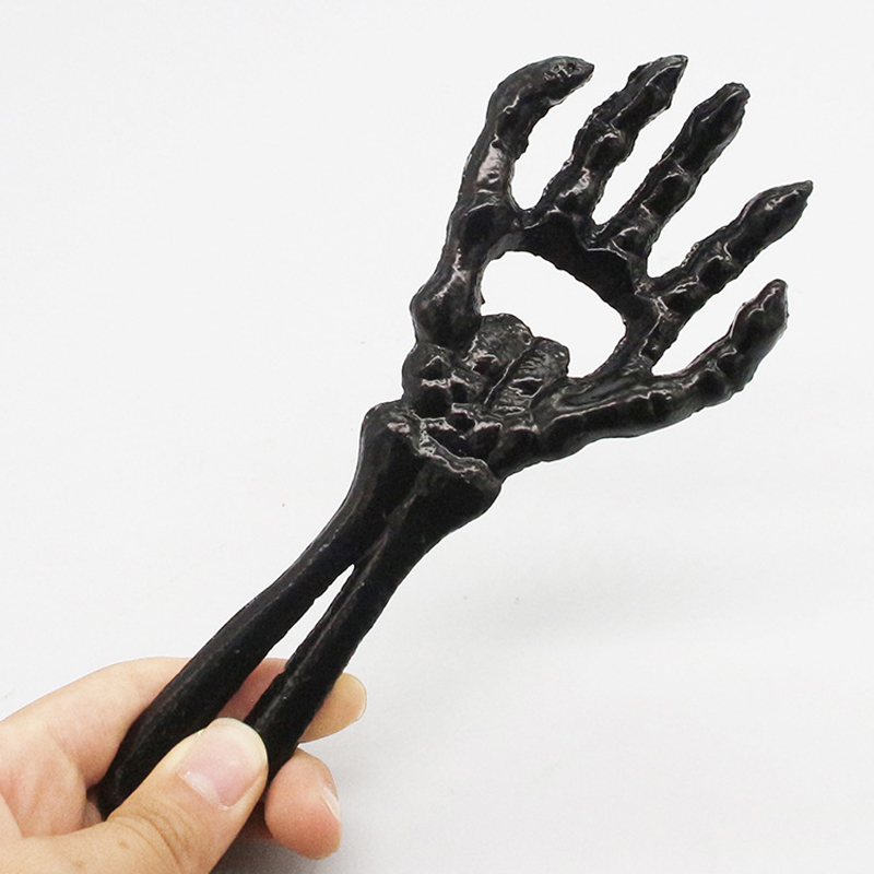 Description Picture 6 of itemDobeli 7.2'' Cast Iron Skeleton Hand Bottle Opener Ghost Festival Metal Metacarpal Bone Finger Beverage Beer Cover Opening Tool