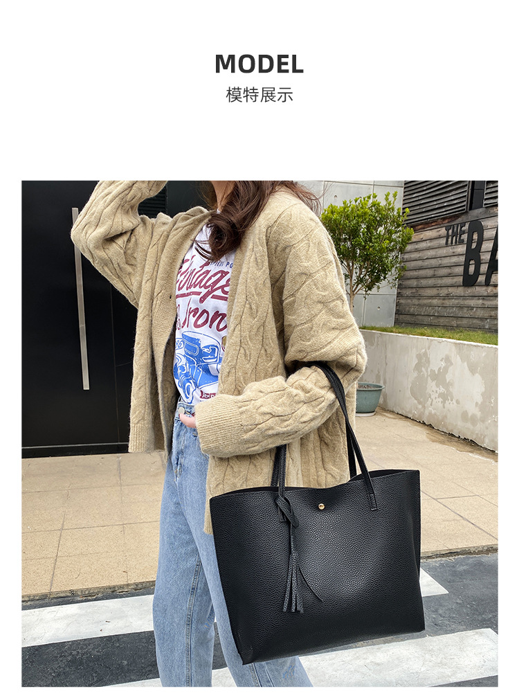 The trendy and stylish lychee patterned tassel decoration underarm tote bag with large capacity shopping bucket for women's bag