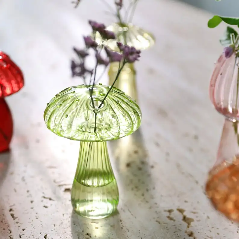 You can use our Mushroom Coloured Glass Vases - Juli to add a touch of simplicity to your space.